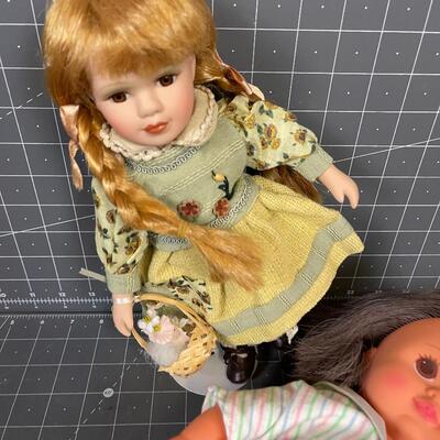 Vintage Dolls: 1 Porcelain and 1 Rubber 