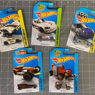 5 new Hot Wheels on the card 