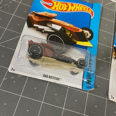 5 new Hot Wheels on the card 