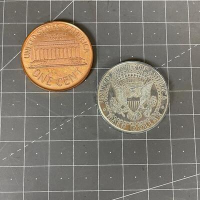 Giant Size Penny and Half Dollar 