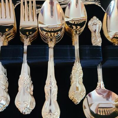 Lot 307: Gold Tone Flatware in Case (Service for 12)