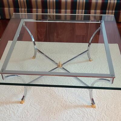 Lot 306: Hollywood Regency: Chrome with Gold Claw Feet, Glass Top Coffee Table