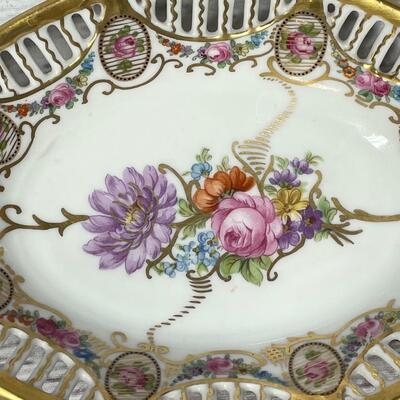 Set of Four Floral Patterned Plates