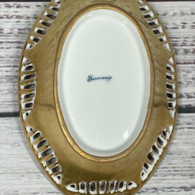 Set of Four Floral Patterned Plates