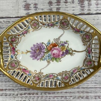 Set of Four Floral Patterned Plates