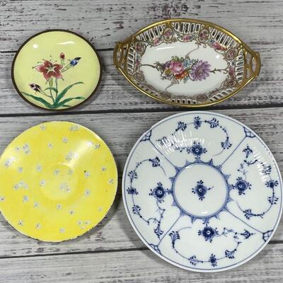 Set of Four Floral Patterned Plates