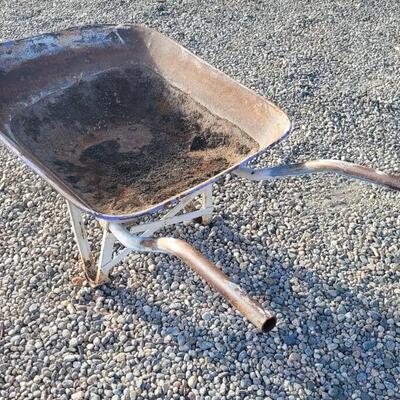 Lot 229: Antique Farm and Garden Metal Wheel Wheelbarrow