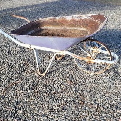 Lot 229: Antique Farm and Garden Metal Wheel Wheelbarrow