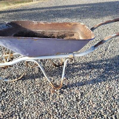 Lot 229: Antique Farm and Garden Metal Wheel Wheelbarrow