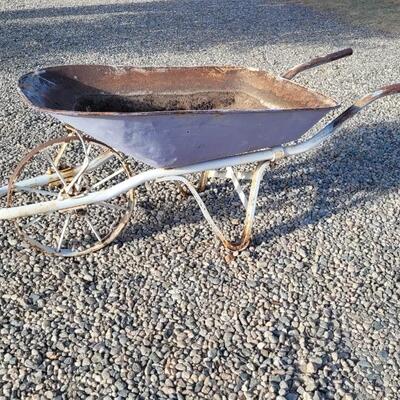 Lot 229: Antique Farm and Garden Metal Wheel Wheelbarrow