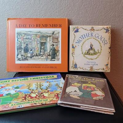 Lot 266: (4) Vintage Children's Holiday Books feat. 1940's MOTHER GOOSE