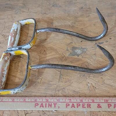 Lot 18: (2) Vintage Chippy Yellow Paint Hay Hooks