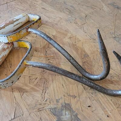Lot 18: (2) Vintage Chippy Yellow Paint Hay Hooks
