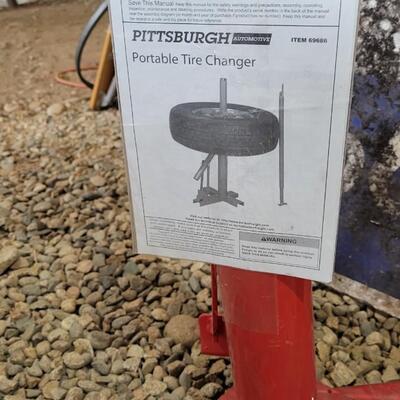 Lot 29: New Unused PITTSBURGH Red Portable Tire Changer Tool