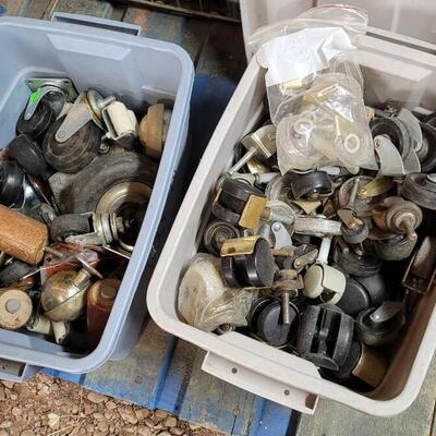 Lot 58: (2) Small Tote Containers w/ Lids full of Caster Wheels