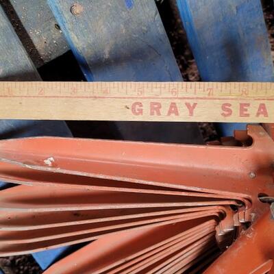 Lot 59: Vintage Orange Metal Farm Garden Stakes