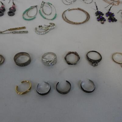 50 pc Costume Jewelry: 1 Necklace, 4 toe rings, 9 rings, 36 pairs of earrings