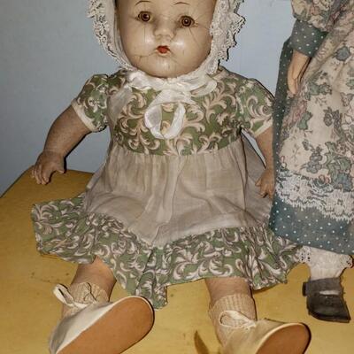 Antique doll with fractures