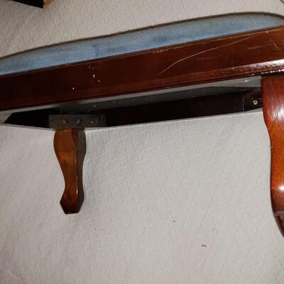 Stool with bluish gray fabric