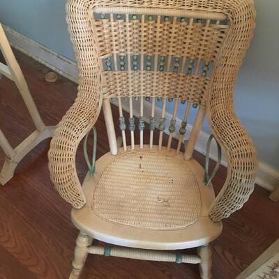 Vintage childâ€™s wicker rocking chair