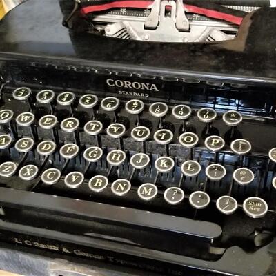 Lot #351  Vintage Corona Typewriter in Case w/paperwork