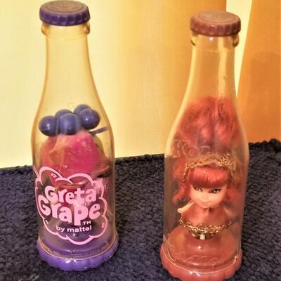Lot #352  2 1960's KOLA KIDDLES - Greta Grape and Kleo Kola - all original