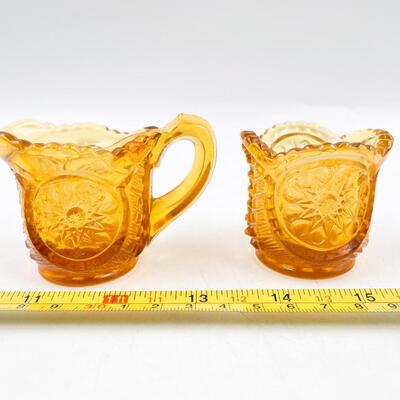 VINTAGE 2â€ AMBER DEPRESSION GLASS CREAMER AND SUGAR SET