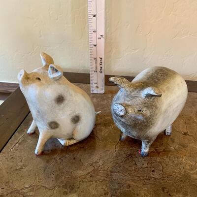 Pair of heavy pig figurines