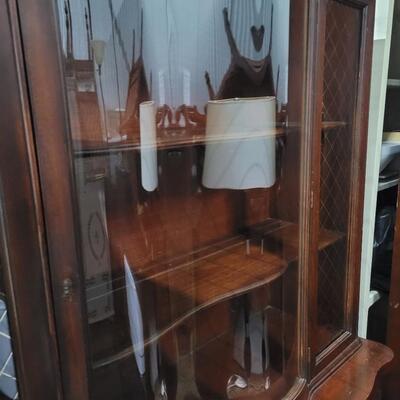 Beautiful antique china cabinet with curved glass