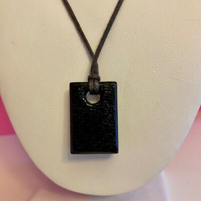 Silver Black and White Sunflower Glass Necklace on Leather Strap