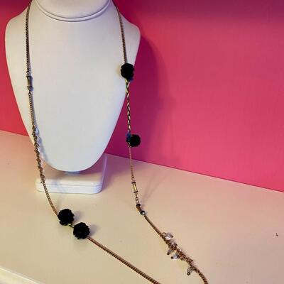 Long Necklace with Beads and Black Pom Pots