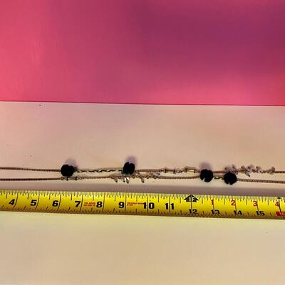 Long Necklace with Beads and Black Pom Pots