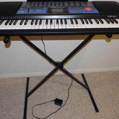 LOT 37  CASIO  ELECTRIC KEYBOARD AND STAND