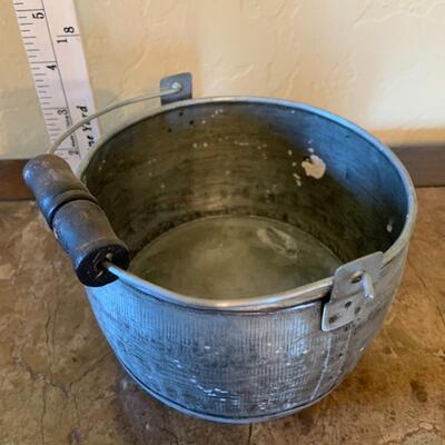 Vintage aluminum pot with wooden handle