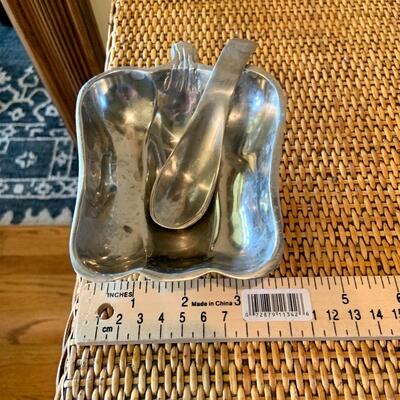 Silver pepper dish with spoon