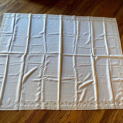 White Tablecloth with Gold and Silver Detailing