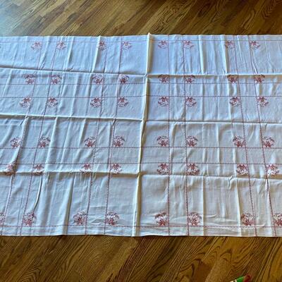 White Tablecloth with Red Flowers and Stitching