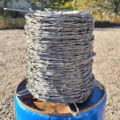 Lot 84: Large Unused Roll of Fencing Barbed Wire
