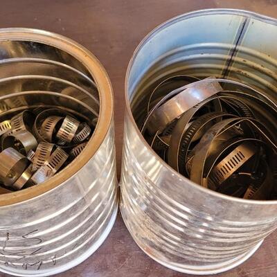 Lot 93: (2) Coffee Cans with Hose Clamps Assorted Sizes