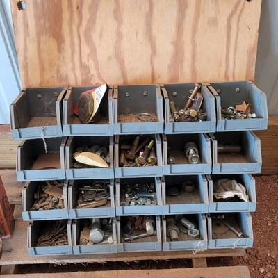 Lot 125: Hardware Caddy Attached to Wood Mounting Board