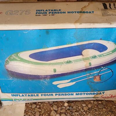 Lot 152: Vintage Inflatable 4 person Motorboat UNTESTED