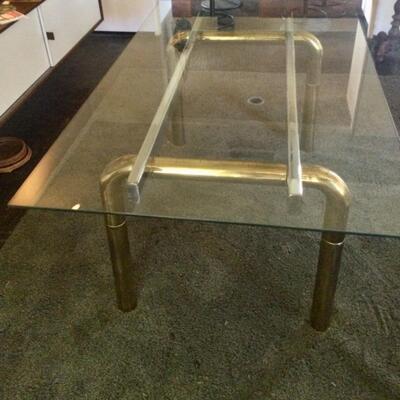 Custom built glass topped Dining table Crome and brass base