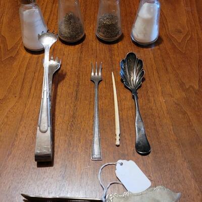 Lot 98: Vintage Cut Crystal Flower Salt & Pepper  2 Sets, Curvee Silver Spreader, Sugar Tongs, Berry Spoon, Oyster Fork and Pick