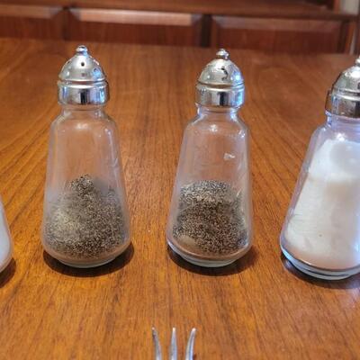 Lot 98: Vintage Cut Crystal Flower Salt & Pepper  2 Sets, Curvee Silver Spreader, Sugar Tongs, Berry Spoon, Oyster Fork and Pick