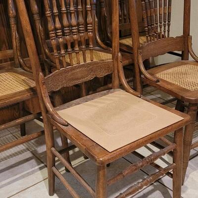 Lot 109: (5) Antique Oak Chairs (4 Cane Seat and one need Repair and comes with Seat Material