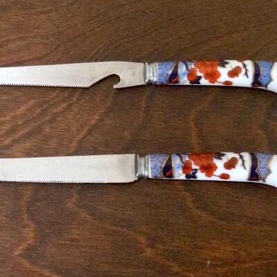 Two English made knives with stainless blades and porcelain handles