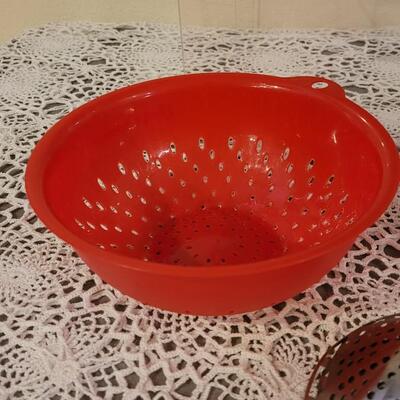 Lot 127: (2) Colanders. Steam Basket and Grater