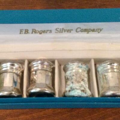 Boxed set of individual salt and pepper shakers