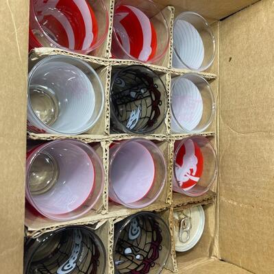 11 Coca-Cola glasses and vintage can