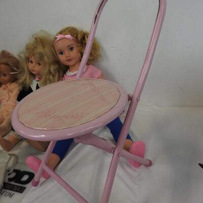 4 Dolls and Pink Children's Chair.
